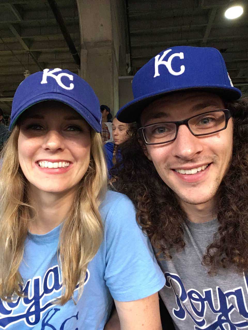 Selfie of Amanda and her partner in KC Royals hats