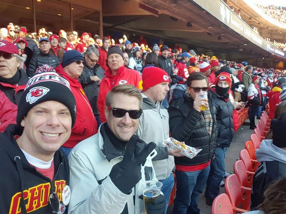 Kelly and family at a football game